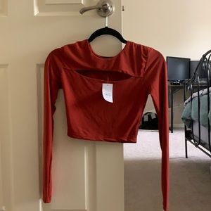 Long-sleeve orange cropped shirt